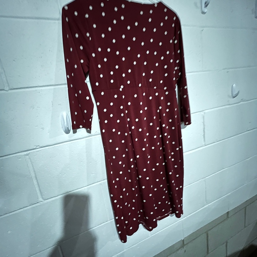 Dress with a sinch waist accented with the gathereed waistline